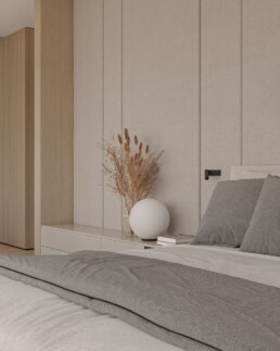 Neutral bedroom with natural textures and sculptural ceramic vase
