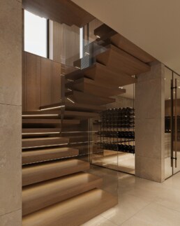 Floating timber staircase descending beside the wine display